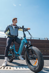 a man is riding DYU FF500 20 Inch Fat Tire Electric Bike